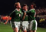 29 October 1997; Denis Irwin of Republic of Ireland celebrates after scoring his side's first goal with team-mates Steve Staunton, left, and David Connelly, right, during the FIFA World Cup 1998 Qualifier Play-off 1st Leg between Republic of Ireland and Belgium at Lansdowne Road in Dublin. Photo by David Maher/Sportsfile