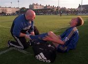 5 August 1998; Stéphane Guivarc'h of Newcastle United is attended to by Physiotherapist Derek Wright during the Club Friendly between Bray Wanderers and Newcastle United at the Carlisle Grounds in Bray, Wicklow. Photo by Ray McManus/Sportsfile