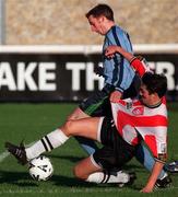 25 October 1998; Eoin Bennis of UCD is tackled by Peter Hutton of Derry City during the Harp Lager National League Premier Division match between UCD and Derry City at the Belfield Bowl in Dublin. Photo by Matt Browne/Sportsfile
