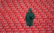 17 November 1996; A lone supporter listens to a radio during the Harp Lager National League Premier Division match between Shamrock Rovers and Cork City at Tolka Park in Dublin. Photo by Ray McManus/Sportsfile