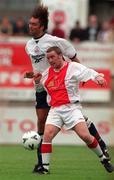 25 July 1998; Jason Byrne of St. Patrick's Athletic in action against Greg Strong of Bolton Wanderers during the Club Friendly between St. Patrick's Athletic and Bolton Wanderers at Richmond Park in Dublin. Photo by Brendan Moran/Sportsfile