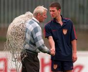 28 July 1998; St. Patrick's Athletic groundsman Harry Boland, left, greets UEFA U18 European Championship medal winner Keith Doyle during a St. Patrick's Athletic Training Session at Richmond Park in Dublin. Photo by Matt Browne/Sportsfile