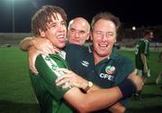 26 July 1998; Liam George of Republic of Ireland, with manager Brian Kerr, right, and assistant coach Noel O'Reilly, centre, celebrates following the UEFA European Under-18 Championship Final between Germany and Republic of Ireland at GSZ Stadium in Larnaca, Cyprus. Photo by David Maher/Sportsfile