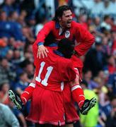 22 July 1998; Liam Kelly of Shelbourne celebrates with team-mate Mark Rutherford, 11, after his side's first goal, an own goal scored by Sergio Porrini of Rangers, during the UEFA Cup First Qualifying Round 2nd Leg between Shelbourne and Rangers at Prenton Park in Birkenhead, Liverpool. Photo by Matt Browne/Sportsfile