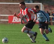 25 October 1998; Michael Kelly of Derry City in action against Ciaran Kavanagh of UCD during the Harp Lager National League Premier Division match between UCD and Derry City at the Belfield Bowl in Dublin. Photo by Ray Lohan/Sportsfile