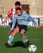 25 October 1998; Michael O'Byrne of UCD in action against Peter Hutton of Derry City during the Harp Lager National League Premier Division match between UCD and Derry City at the Belfield Bowl in Dublin. Photo by Ray McManus/Sportsfile