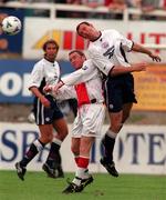 25 July 1998; Mike Whitlow of Bolton Wanderers in action against Jason Byrne of St. Patrick's Athletic during the Club Friendly between St. Patrick's Athletic and Bolton Wanderers at Richmond Park in Dublin. Photo by Brendan Moran/Sportsfile