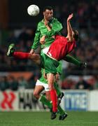26 April 1995; Paul McGrath of Republic of Ireland in action against Portugal during the UEFA EURO1996 Qualifier Group 6 match between Republic of Ireland and Portugal at Lansdowne Road in Dublin. Photo by Ray McManus/Sportsfile