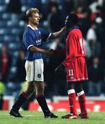 29 July 1998; Artur Numan of Rangers shakes hands with Mark Rutherford of Shelbourne following the UEFA Cup First Qualifying Round 2nd Leg between Rangers and Shelbourne at Ibrox Stadium in Glasgow, Scotland. Photo by Brendan Moran/Sportsfile