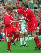 1 August 1998; Michael Owen of Liverpool celebrates after scoring his side's second goal with team-mate Steve McManaman, right, during the Carlsberg Trophy Final match between Liverpool and Leeds United at Lansdowne Road in Dublin. Photo by Damien Eagers/Sportsfile