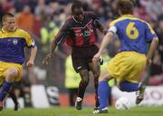 23 July 2003; Mark Rutherford, Bohemians, in action against BATE Borisov's Kenadz Maedas and Aliaksei Baha. Champions League Qualifier, 2nd Leg. Bohemians v Bate Borisov. Dalymount Park, Dublin. Picture credit; David Maher / SPORTSFILE *EDI*