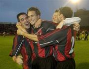 23 July 2003; Bohemian players left to right,  Fergal Harkin, Kevin Hun, Bobby Ryan and Damien Lynch, celebrate at the end of the game. Champions League Qualifier, 2nd Leg. Bohemians v Bate Borisov. Dalymount Park, Dublin. Picture credit; David Maher / SPORTSFILE *EDI*