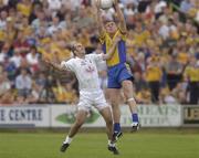 26 July 2003; Seamus O'Neill of Roscommon in action against Killian Brennan of Kildare during the Bank of Ireland Senior Football Championship Qualifier between Kildare and Roscommon at O'Moore Park in Portlaoise, Laois. Photo by Damien Eagers/Sportsfile
