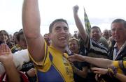 26 July 2003; Frankie Dolan of Roscommon celebrates with supporters after his side's victory over Kildare during the Bank of Ireland Senior Football Championship Qualifier between Kildare and Roscommon at O'Moore Park in Portlaoise, Laois. Photo by Damien Eagers/Sportsfile