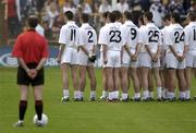 26 July 2003; The Kildare team stand for the national anthem prior to the Bank of Ireland Senior Football Championship Qualifier between Kildare and Roscommon at O'Moore Park in Portlaoise, Laois. Photo by Damien Eagers/Sportsfile
