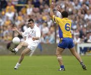 26 July 2003; John Doyle of Kildare in action against Francie Grehan of Roscommon during the Bank of Ireland Senior Football Championship Qualifier between Kildare and Roscommon at O'Moore Park in Portlaoise, Laois. Photo by Damien Eagers/Sportsfile