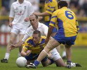 26 July 2003; Morgan Beirne of Roscommon in action against Killian Brennan of Kildare during the Bank of Ireland Senior Football Championship Qualifier between Kildare and Roscommon at O'Moore Park in Portlaoise, Laois. Photo by Damien Eagers/Sportsfile