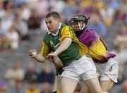 27 July 2003; Damien Quinn of Antrim in action against Chris McGrath of Wexford during the Guinness All-Ireland Senior Hurling Championship Quarter Final between Wexford v Antrim at Croke Park in Dublin. Photo by Pat Murphy/Sportsfile