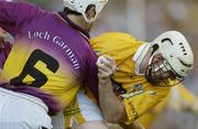 27 July 2003; Colm McGuickan of Antrim in action against Declan Ruth of Wexford during the Guinness All-Ireland Senior Hurling Championship Quarter Final between Wexford v Antrim at Croke Park in Dublin. Photo by Pat Murphy/Sportsfile