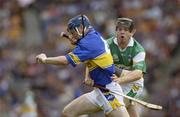 27 July 2003; Martin Maher of Tipperary in action against Joe Errity of Offaly during the Guinness All-Ireland Senior Hurling Championship Quarter Final match between Offaly and Tipperary at Croke Park in Dublin. Photo by Ray McManus/Sportsfile