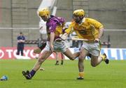 27 July 2003; Rory McCarthy of Wexford in action against Conor Cunning of Antrim during the Guinness All-Ireland Senior Hurling Championship Quarter Final between Wexford v Antrim at Croke Park in Dublin. Photo by Pat Murphy/Sportsfile