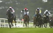 28 July 2003; Rapid Deployment, with Derek O'Connor up, left, race clear of eventual second, Raise A Storm, with Karl Wyse up, second from left, and eventual third, Pakiefromathleague, with Roger Loughran up, second from right, on their way to winning the G.P.T. Galway Q.R. Handicap during the Galway Racing Festival at Ballybrit racecourse in Galway. Photo by Brendan Moran/Sportsfile