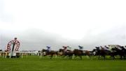 28 July 2003; The Runners and Riders go past the post, first time round, during the G.P.T. Galway Q.R. Handicap during the Galway Racing Festival at Ballybrit racecourse in Galway. Photo by Brendan Moran/Sportsfile