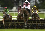 29 July 2003; Clounties Hill, with Ruby Walsh up, clear the last on their way to winning the Albatros Feeds Maiden Hurdle during the Galway Racing Festival at Ballybrit racecourse in Galway. Photo by Brendan Moran/Sportsfile