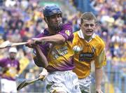 27 July 2003; Barry Lambert of Wexford in action against Malachy Molloy of Antrim during the Guinness All-Ireland Senior Hurling Championship Quarter Final between Wexford v Antrim at Croke Park in Dublin. Photo by Pat Murphy/Sportsfile
