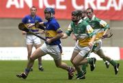 27 July 2003; Paul Kelly of Tipperary in action against Brendan Murphy of Offaly during the Guinness All-Ireland Senior Hurling Championship Quarter Final match between Offaly and Tipperary at Croke Park in Dublin. Photo by Pat Murphy / Sportsfile