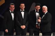 3 November 2017; Dublin footballer Cian O'Sullivan is presented with his PwC All Star award from Uachtarán Chumann Lúthchleas Gael Aogán Ó Fearghail, in the company of Feargal O'Rourke, left, Managing Partner, PwC, and David Collins, GPA President during the PwC All Stars 2017 at the Convention Centre in Dublin. Photo by Brendan Moran/Sportsfile