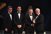 3 November 2017; Mayo footballer Colm Boyle is presented with his PwC All Star award from Uachtarán Chumann Lúthchleas Gael Aogán Ó Fearghail, in the company of Feargal O'Rourke, left, Managing Partner, PwC, and David Collins, GPA President during the PwC All Stars 2017 at the Convention Centre in Dublin. Photo by Brendan Moran/Sportsfile