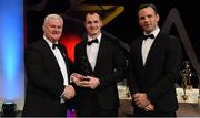 3 November 2017; Warwickshire hurler Liam Watson is presented with his Lory Meagher Champion 15 Player of the Year award by Uachtarán Chumann Lúthchleas Gael Aogán Ó Fearghail, left, and David Collins, GPA President, during the PwC All Stars 2017 at the Convention Centre in Dublin. Photo by Piaras Ó Mídheach/Sportsfile