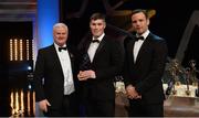 3 November 2017; Warwickshire hurler Paul Uniacke is presented with his Lory Meagher Champion 15 award by Uachtarán Chumann Lúthchleas Gael Aogán Ó Fearghail, left, and David Collins, GPA President, during the PwC All Stars 2017 at the Convention Centre in Dublin. Photo by Piaras Ó Mídheach/Sportsfile