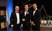 3 November 2017; Warwickshire hurler Dean Bruen is presented with his Lory Meagher Champion 15 award by Uachtarán Chumann Lúthchleas Gael Aogán Ó Fearghail, left, and David Collins, GPA President, during the PwC All Stars 2017 at the Convention Centre in Dublin. Photo by Piaras Ó Mídheach/Sportsfile