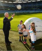 4 November 2017; In attendance at the GAA Healthy Clubs Recognition Event, supported by Irish Life, which saw 58 GAA clubs recognised as the first official ‘Healthy Clubs’ on the island of Ireland is Uachtarán Chumann Lúthchleas Gael Aogán Ó Fearghail with, from left, Conor McDonald, age 6, Méabh McDonald, age 4, Alannah Lalor, age 5, and Aoibhe Lalor age 7, all from the St Colmcilles Healthy Club in Meath. The GAA’s Healthy Clubs Project hopes to transform GAA clubs nationally into hubs for community health and wellbeing. As part of the programme, each club is trained to deliver advice and information programmes on a variety of different topics including, physical activity; emotional wellbeing; healthy eating; community development, to name but a few. For more information, visit: www.gaa.ie/community. Croke Park, Dublin. Photo by Piaras Ó Mídheach/Sportsfile
