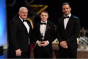 3 November 2017; Derry hurler Paul Cleary is presented with his Nicky Rackard Champion 15 award by Uachtarán Chumann Lúthchleas Gael Aogán Ó Fearghail, left, and David Collins, GPA President, during the PwC All Stars 2017 at the Convention Centre in Dublin.