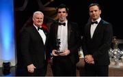 3 November 2017; Derry hurler Sean Cassidy is presented with his Nicky Rackard Champion 15 award by Uachtarán Chumann Lúthchleas Gael Aogán Ó Fearghail, left, and David Collins, GPA President, during the PwC All Stars 2017 at the Convention Centre in Dublin.