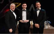 3 November 2017; Derry hurler Gerald Bradley is presented with his Nicky Rackard Champion 15 Player of the Year award by Uachtarán Chumann Lúthchleas Gael Aogán Ó Fearghail, left, and David Collins, GPA President, during the PwC All Stars 2017 at the Convention Centre in Dublin.