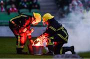 5 November 2017; Firefighters put out a flare ahead of the Irish Daily Mail FAI Senior Cup Final match between Cork City and Dundalk at the Aviva Stadium in Dublin. Photo by Ramsey Cardy/Sportsfile