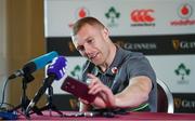 6 November 2017; Keith Earls checks a journalists ringing phone during an Ireland Rugby Press Conference at Carton House in Maynooth, Kildare. Photo by Ramsey Cardy/Sportsfile