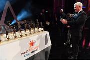 3 November 2017; Uachtarán Chumann Lúthchleas Gael Aogán Ó Fearghail takes a photo of the All Star awards prior to the start of the PwC All Stars 2017 at the Convention Centre in Dublin. Photo by Brendan Moran/Sportsfile