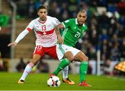 9 November 2017; Josh Magennis of Northern Ireland in action against Ricardo Rodríguez of Switzerland  during the FIFA 2018 World Cup Qualifier Play-off 1st leg match between Northern Ireland and Switzerland at Windsor Park in Belfast. Photo by Oliver McVeigh/Sportsfile