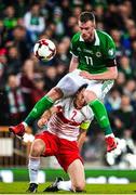 9 November 2017; Chris Brunt of Northern Ireland in action against Stephan Lichtsteiner of Switzerland  during the FIFA 2018 World Cup Qualifier Play-off 1st leg match between Northern Ireland and Switzerland at Windsor Park in Belfast. Photo by Oliver McVeigh/Sportsfile