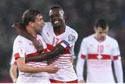 9 November 2017; Remo Freuler, left, of Switzerland celebrates with teammate Steven Zuber after the FIFA 2018 World Cup Qualifier Play-off 1st leg match between Northern Ireland and Switzerland at Windsor Park in Belfast. Photo by Eóin Noonan/Sportsfile