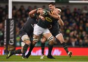 11 November 2017; Francois Louw of South Africa is tackled by CJ Stander, left and Jonathan Sexton of Ireland during the Guinness Series International match between Ireland and South Africa at the Aviva Stadium in Dublin. Photo by Eóin Noonan/Sportsfile