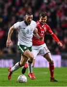 11 November 2017; Daryl Murphy of Republic of Ireland in action against Andreas Bjelland of Denmark during the FIFA 2018 World Cup Qualifier Play-off 1st Leg match between Denmark and Republic of Ireland at Parken Stadium in Copenhagen, Denmark. Photo by Ramsey Cardy/Sportsfile