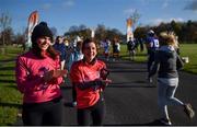 12 November 2017; Carol O'Sullivan, left, and Eimear Burgin from Co. Kildare encourage other runners during the Remembrance Run 5K 2017 at Phoenix Park in Dublin. Photo by David Fitzgerald/Sportsfile