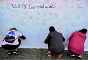 12 November 2017; Runners pay their respects on the 'Wall of Remembrance' prior to the Remembrance Run 5K 2017 at Phoenix Park in Dublin. Photo by David Fitzgerald/Sportsfile