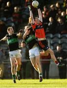 12 November 2017; Robbie Bourke of Adare in action against Alan O'Donovan, left, and Aidan O'Reilly of Nemo Rangers during the AIB Munster GAA Football Senior Club Championship Semi-Final match between Nemo Rangers and Adare at Mallow GAA complex in Mallow, Co Cork. Photo by Piaras Ó Mídheach/Sportsfile